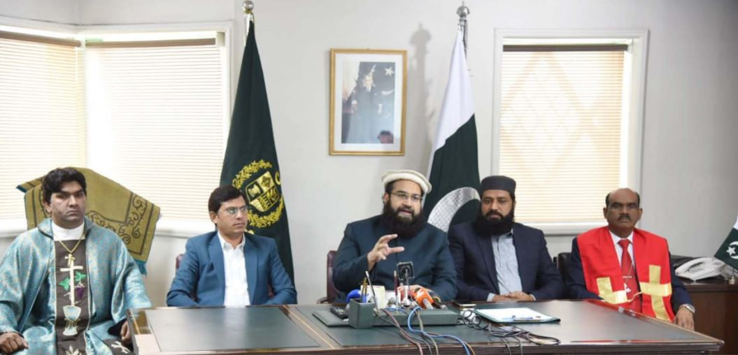 sapm on religious harmony and middle east hafiz tahir mehmood ashrafi with christian community leaders in islamabad photo pid