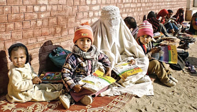 back to school special mother of two enrols in class one