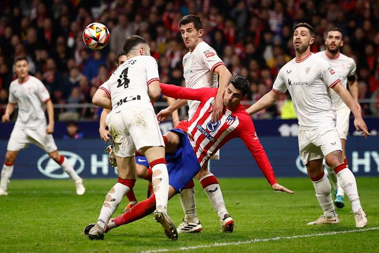 atletico madrid s alvaro morata in action with athletic bilbao s aitor paredes reuters juan medina purchase licensing rights photo reuters