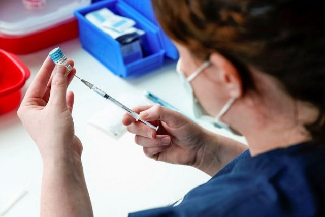 in a file photo a healthcare professional prepares a dose of the pfizer vaccine as high risk workers receive the first vaccines in the state of victoria s rollout of the program in melbourne australia photo reuters in a file photo a healthcare professional prepares a dose of the pfizer vaccine as high risk workers receive the first vaccines in the state of victoria s rollout of the program in melbourne australia photo reuters
