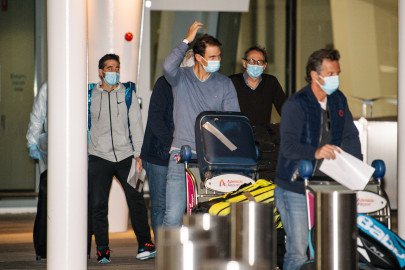 two covid 19 cases on australian open flight arrivals to quarantine