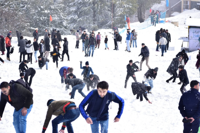 people enjoy snowball fight at the galiyat snow festival on saturday photo express people enjoy snowball fight at the galiyat snow festival on saturday photo express