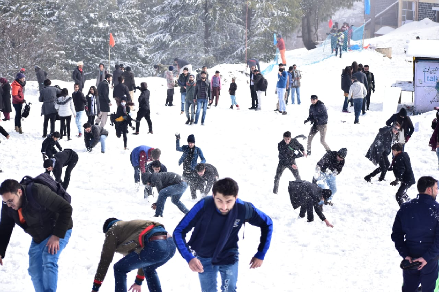 people enjoy snowball fight at the galiyat snow festival on saturday photo express