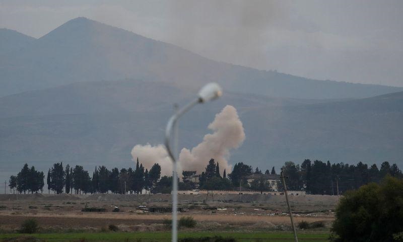 smoke rises as azerbaijan s forces shell targets during the fighting over the breakaway region of nagorno karabakh near the city of terter azerbaijan october 7 2020 photo reuters