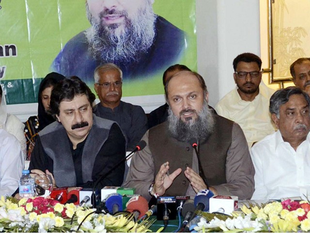 former balochistan chief minister jam kamal khan addressing a press conference in quetta photo inp file