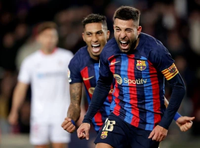 xavi cautious as barca extend lead