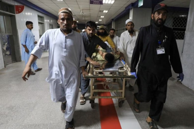 people transport a man who was injured after a blast in bajaur district of khyber pakhtunkhwa at the lady reading hospital in peshawar pakistan july 30 2023 photo reuters file people transport a man who was injured after a blast in bajaur district of khyber pakhtunkhwa at the lady reading hospital in peshawar pakistan july 30 2023 photo reuters file