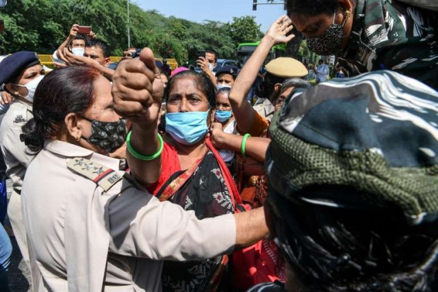 demonstrators in new delhi protest wednesday over the death of a 19 year old woman allegedly gang raped in india s latest horrific sexual assault afp demonstrators in new delhi protest wednesday over the death of a 19 year old woman allegedly gang raped in india s latest horrific sexual assault afp