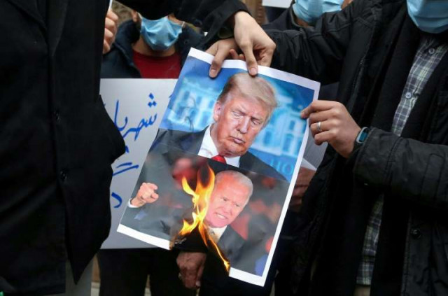 students in tehran burn posters depicting us president donald trump and president elect joe biden during a rally on november 28 2020 to protest the killing of nuclear scientist mohsen fakhrizadeh afp students in tehran burn posters depicting us president donald trump and president elect joe biden during a rally on november 28 2020 to protest the killing of nuclear scientist mohsen fakhrizadeh afp