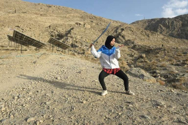 a hazara student practises shaolin kung fu during a self defence martial arts training class on the outskirts of quetta afp a hazara student practises shaolin kung fu during a self defence martial arts training class on the outskirts of quetta afp