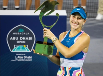 bencic clinches abu dhabi title