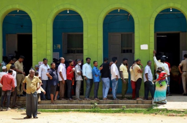people wait in a queue to cast their vote at a polling station during karnataka state assembly election in bengaluru india may 10 2023 reuters stringer people wait in a queue to cast their vote at a polling station during karnataka state assembly election in bengaluru india may 10 2023 reuters stringer