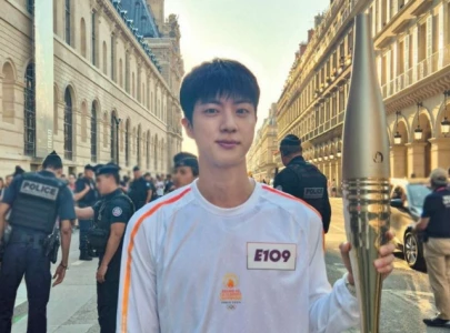 bts s jin turns heads at gucci s after party in milan earning praise from creative director