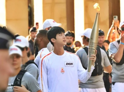 bts jin makes historic appearance as south korea s torchbearer at paris olympics 2024 bts jin makes historic appearance as south korea s torchbearer at paris olympics 2024