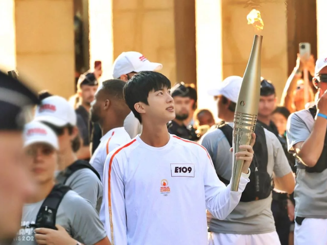 bts jin makes historic appearance as south korea s torchbearer at paris olympics 2024 bts jin makes historic appearance as south korea s torchbearer at paris olympics 2024
