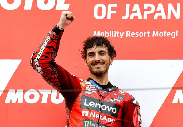 ducati lenovo team s francesco bagnaia celebrates on the podium after winning the japanese grand prix at mobility resort motegi motegi japan on october 6 2024 photo reuters ducati lenovo team s francesco bagnaia celebrates on the podium after winning the japanese grand prix at mobility resort motegi motegi japan on october 6 2024 photo reuters