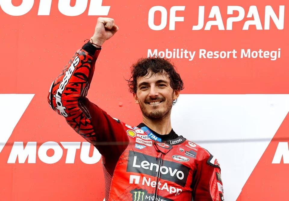 ducati lenovo team s francesco bagnaia celebrates on the podium after winning the japanese grand prix at mobility resort motegi motegi japan on october 6 2024 photo reuters