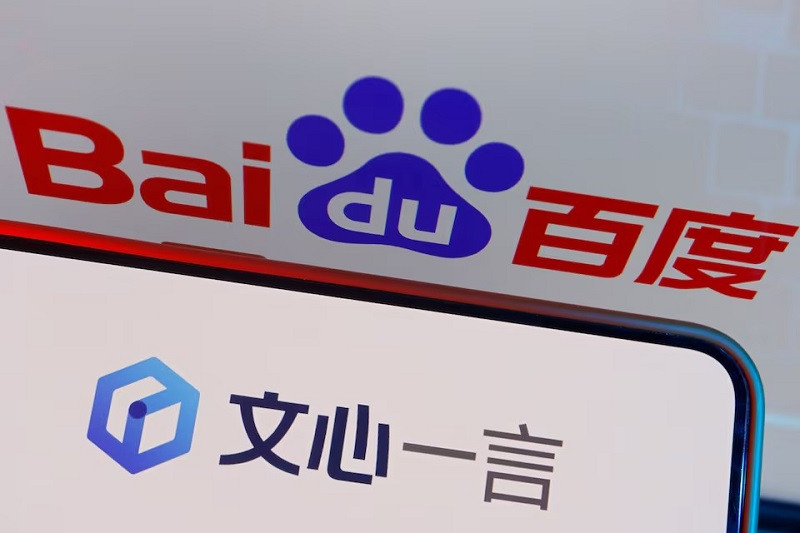 the logo of baidu s ai chatbot ernie bot is displayed near a screen showing the baidu logo june 28 2023 photo reuters