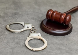 landlord on bail for murder arrested for illegal arms possession