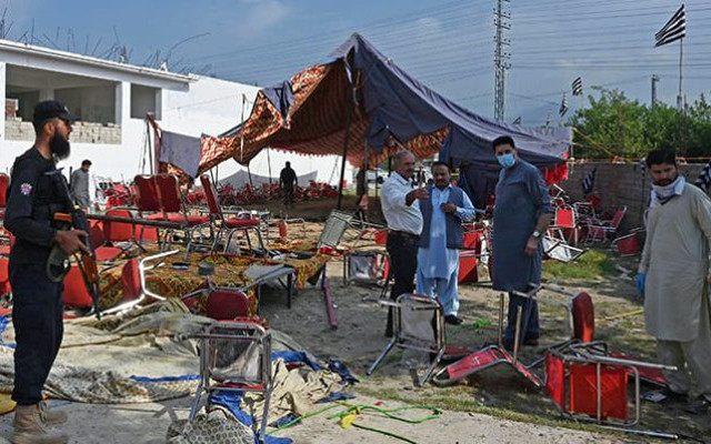 security personnel examine the site of a bomb blast in bajaur district of khyber pakhtunkhwa province on july 31 2023 photo afp file