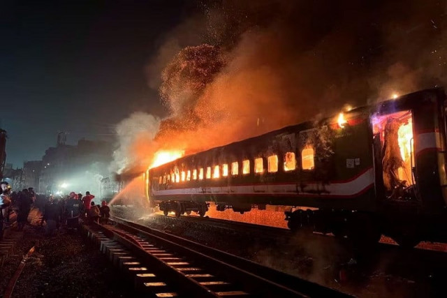 bangladesh poll booths burn on election eve as train arson kills four bangladesh poll booths burn on election eve as train arson kills four