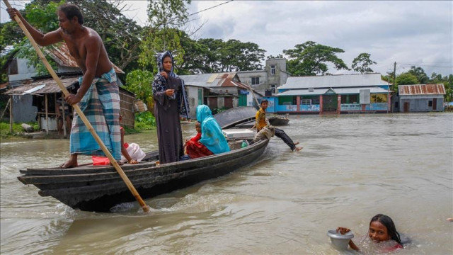 people ride on boat in flooded area after heavy monsoon rains in dohar near dhaka bangladesh on july 24 2020 more than 9 6 million people have been affected by monsoon floods devastating large areas of india bangladesh and nepal photo aa people ride on boat in flooded area after heavy monsoon rains in dohar near dhaka bangladesh on july 24 2020 more than 9 6 million people have been affected by monsoon floods devastating large areas of india bangladesh and nepal photo aa