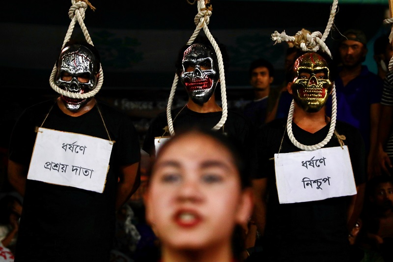 artists demonstrate a performance art as part of their protest demanding justice for an alleged gang rape of a woman in noakhali southern district of bangladesh photo reuters file