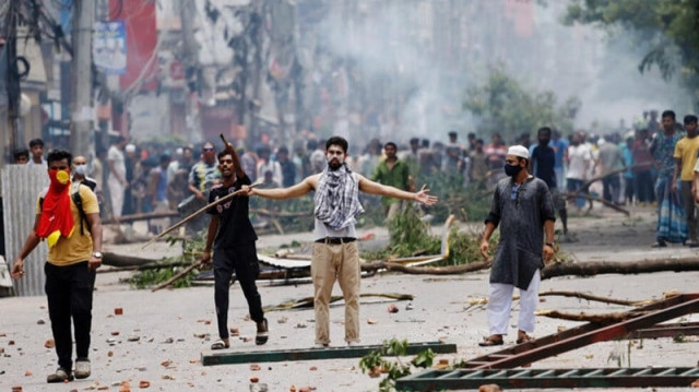 protesters clash with border guard bangladesh bgb and the police outside the state owned bangladesh television in dhaka on july 19 2024 photo afp protesters clash with border guard bangladesh bgb and the police outside the state owned bangladesh television in dhaka on july 19 2024 photo afp