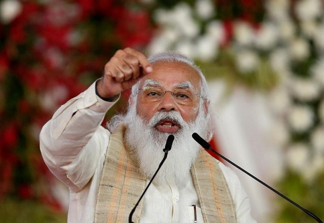 india s prime minister narendra modi addresses a gathering before flagging off the dandi march or salt march to celebrate the 75th anniversary of india s independence in ahmedabad india march 12 2021 photo reuters