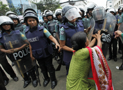 garment workers protest against new wage structure