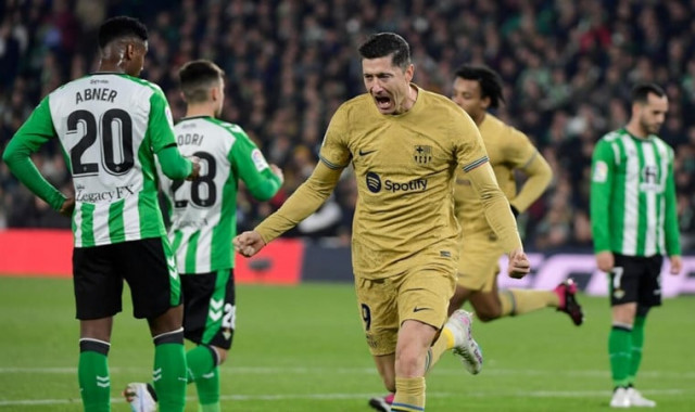barca earn tense win at betis barca earn tense win at betis