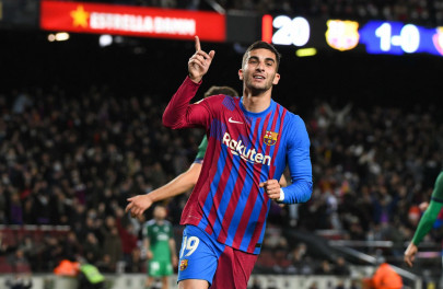 torres scores twice as barca thrash osasuna