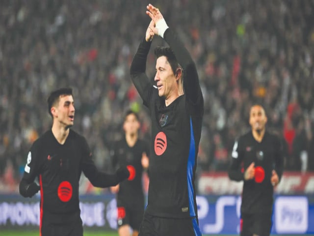 barcelona s polish forward robert lewandowski c celebrates after scoring in the rout of red star photo afp