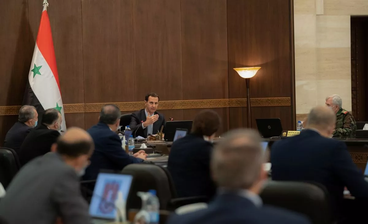 syria s president bashar al assad speaks as he meets with the syrian cabinet in damascus syria in this handout picture released by sana on march 30 2021 sana handout via reuters syria s president bashar al assad speaks as he meets with the syrian cabinet in damascus syria in this handout picture released by sana on march 30 2021 sana handout via reuters