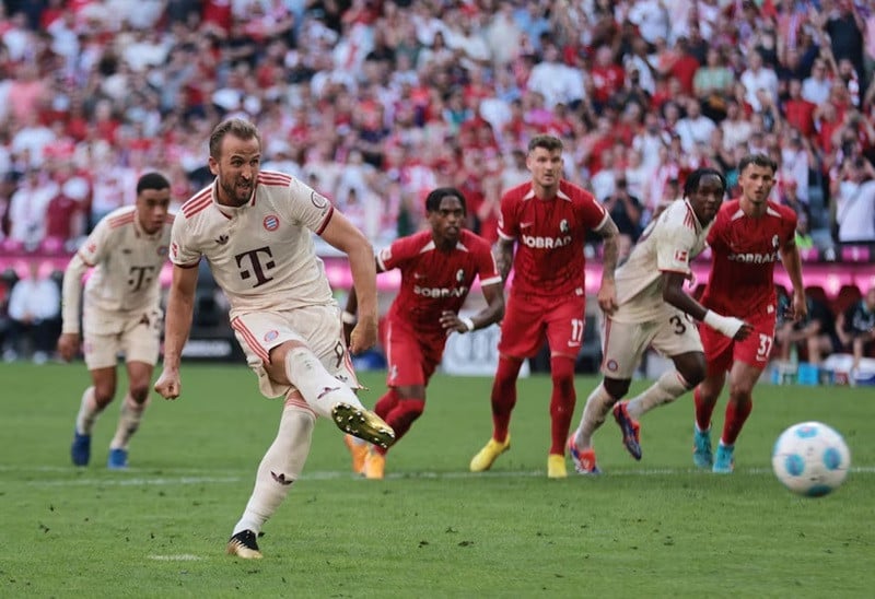 bayern munich s harry kane scores their first goal from the penalty spot allianz arena munich germany   september 1 2024 photo reuters