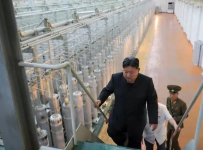 north korea unveils photos of uranium enrichment facility