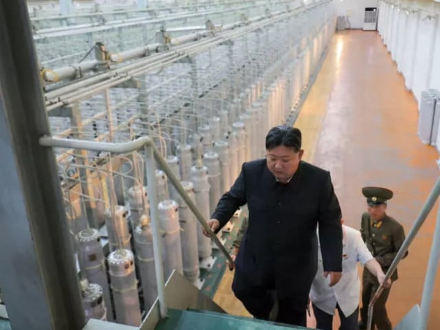 this undated photo released from north korea s official korean central news agency kcna on september 13 2024 shows north korean leader kim jong un front inspecting the nuclear weapons institute photo afp