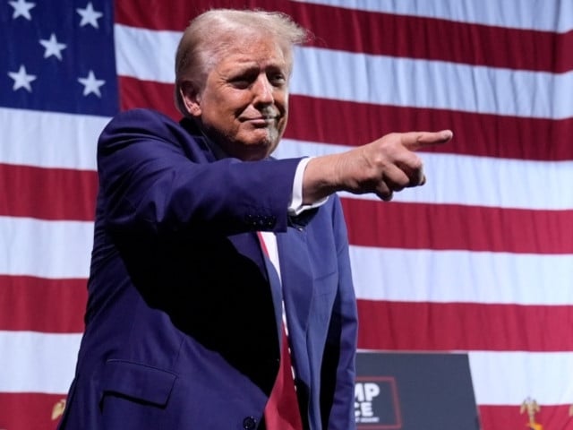 former u s president donald trump gestures as he departs after speaks at a campaign event at the linda ronstadt music hall thursday sept 12 2024 in tucson ariz photo ap