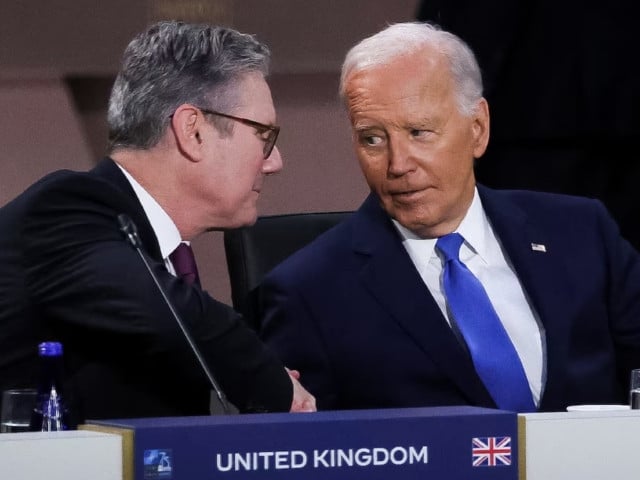 u s president joe biden and britain s prime minister keir starmer are seen at a meeting in washington u s july 11 2024 photo reuters