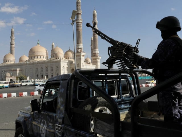 a police trooper mans a machine gun mounted on a patrol vehicle outside a rally in sanaa yemen jan 5 2024 photo epa