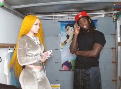 kai cenat attempts push up with ice spice on his back during u haul truck livestream