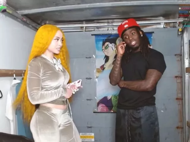kai cenat attempts push up with ice spice on his back during u haul truck livestream