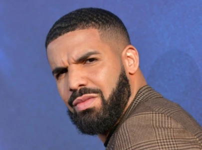 drake teases new music with bahamas photo after dropping fighting irish freestyle