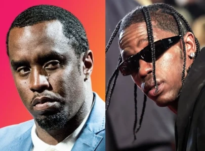 travis scott runs away from diddy in resurfaced clip fans react