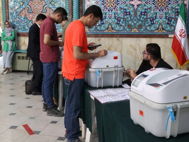 people vote during the runoff parliamentary elections in tehran iran may 10 2024 majid asgaripour wana west asia news agency photo via reuters f