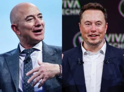 elon musk applauds jeff bezos washington post policy shift with one word