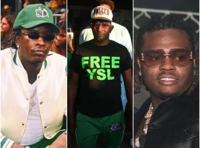 young thug s father defends gunna and joins him onstage in atlanta