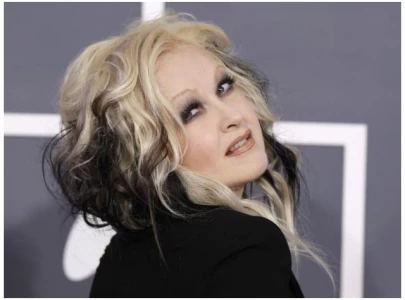 cyndi lauper s time after time lyric inspired by a backward watch