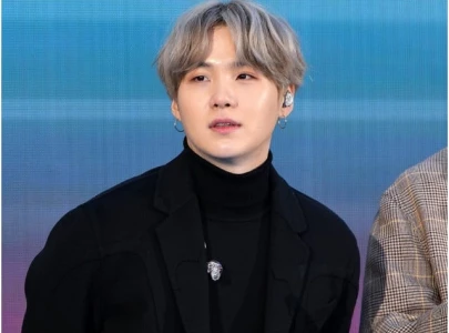 bts s suga unveils agust d tour d day the original poster teases special photobook