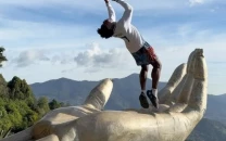 ishowspeed performs dangerous backflip from the hand of god sculpture in guatemala